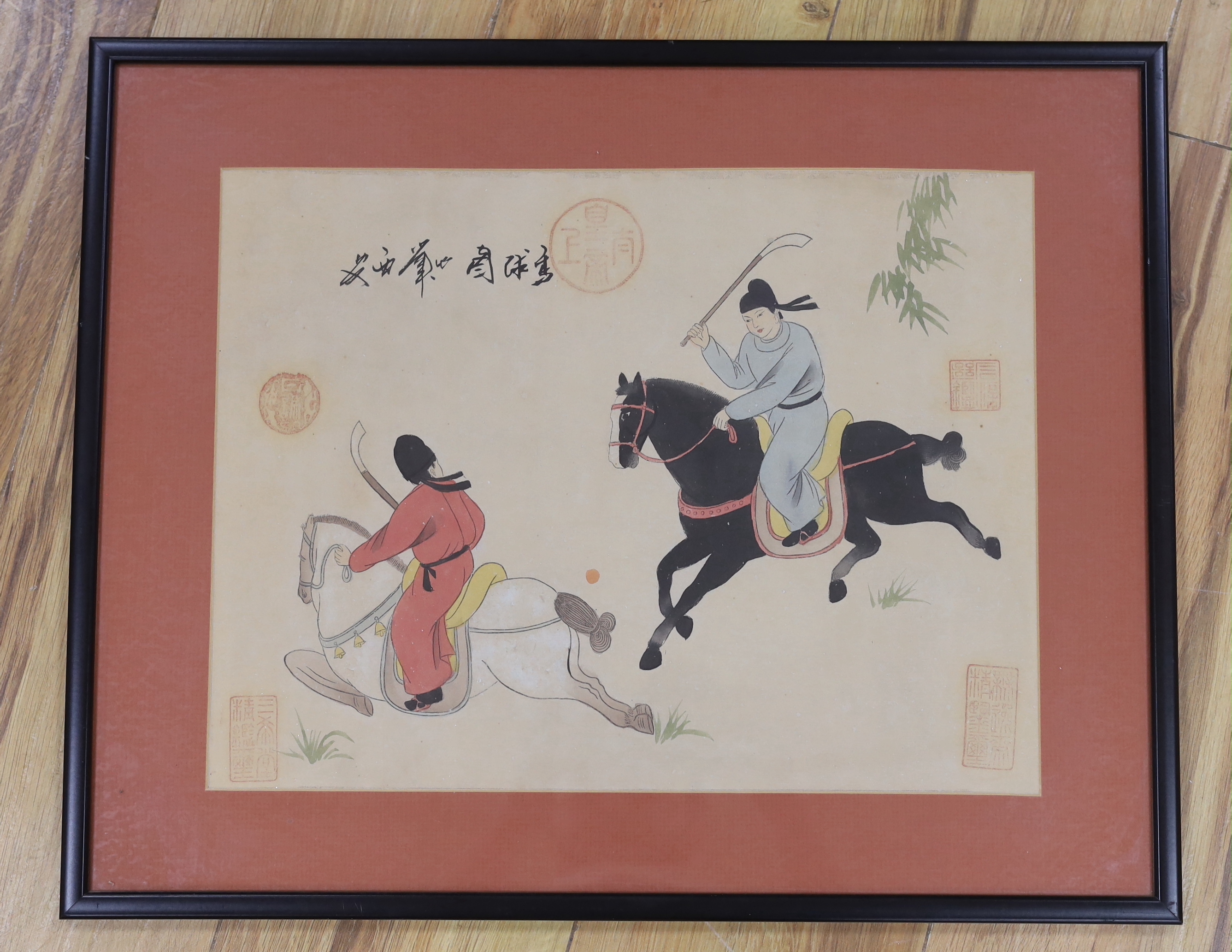 Chinese School, woodblock print, Polo players on horseback, 38 x 29cm